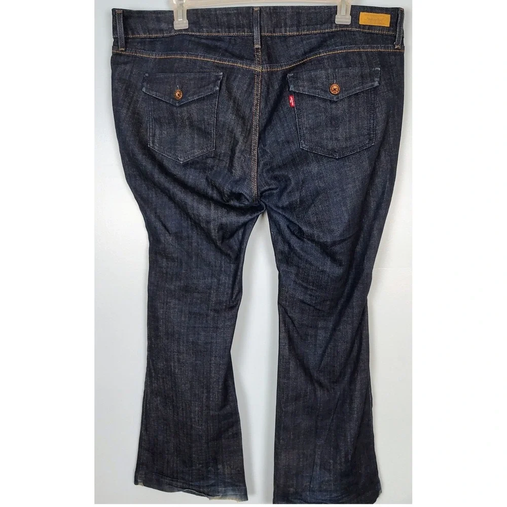 Levis 542 Flare Jeans Women 22M Dark Wash Blue Denim Distressed Hem Mid Rise y2k